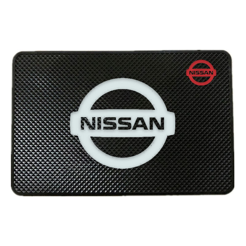 Automotive anti-skid pad with logo vehicle mounting pad