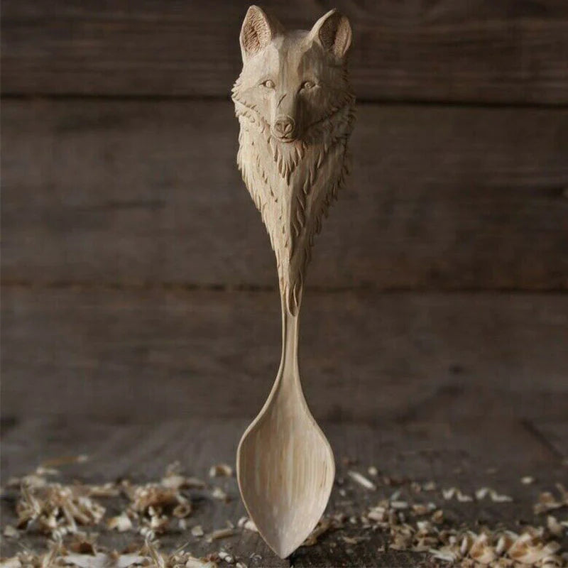 Carved wooden spoon for kitchen cooking