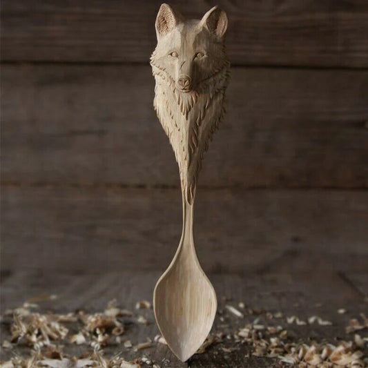 Carved wooden spoon for kitchen cooking