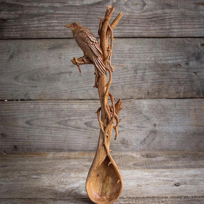 Carved wooden spoon for kitchen cooking