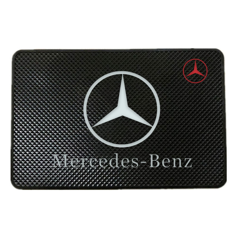 Automotive anti-skid pad with logo vehicle mounting pad