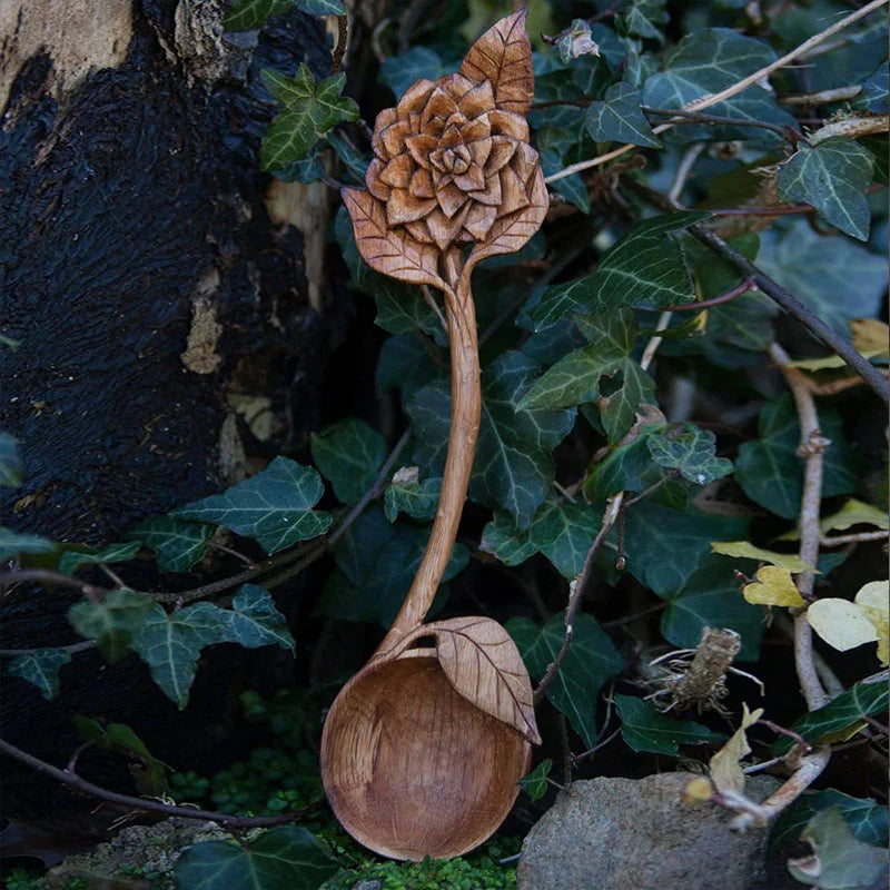 Carved wooden spoon for kitchen cooking